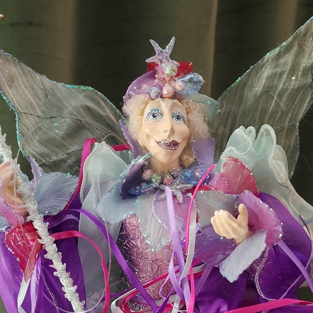 Enchanting Fairy Figurine with Purple Accents